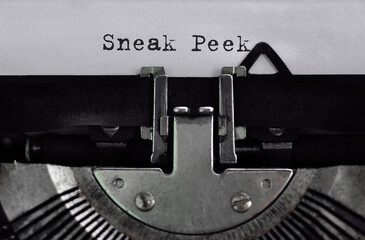Text Sneak peak typed on retro typewriter