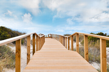Landscape Of Wooden Path To Ocean Beach Over Dunes Outdoors