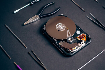 Computer disassembled HDD hard drive data disc SSD, backup part of the PC or laptop. Recovery,...