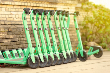 Electric scooters, scooter parking in the city. Electric scooter rental