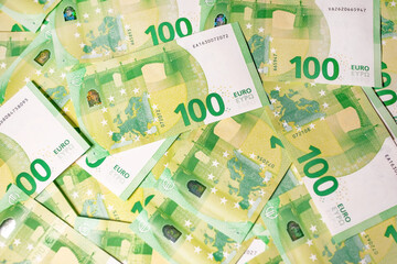 100 euro banknotes. Background with many 100 euro banknotes
