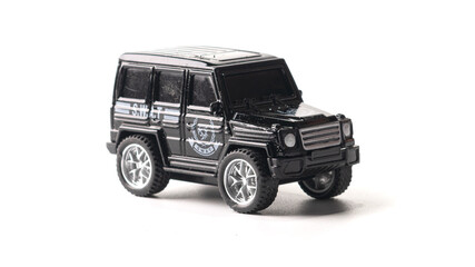 Plastic toy army car isolated on white background