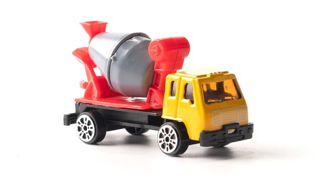 An isolated shot of a childs constructive cement mixer truck.