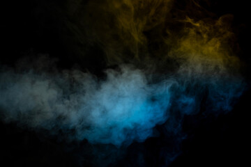 Fototapeta na wymiar Blue and yellow steam on a black background.