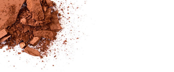 Broken makeup blush, as a sample of a cosmetic product on a white background. Top view, flat lay. Banner