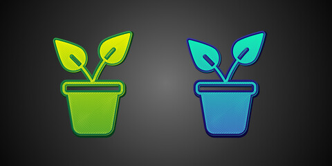 Green and blue Plant in pot icon isolated on black background. Plant growing in a pot. Potted plant sign. Vector