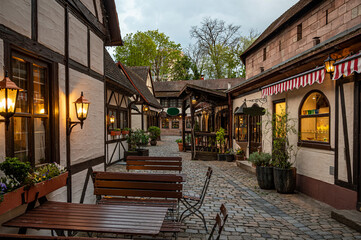Fototapeta na wymiar Medieval small half-timbered shops in Nuremberg, Germany