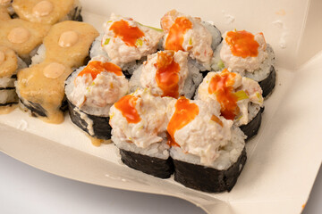 Sushi with cream cheese isolated on white background.