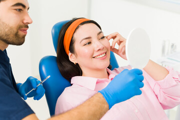 Gorgeous woman getting botulinum toxin injections to prevent wrinkles