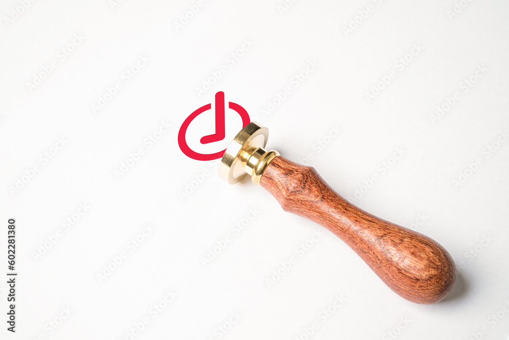 Aufkleber wooden stamp with red correct or tick mark sign for approve project and quality document on white pa