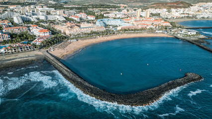 Top view of a seawall next to the beach in Tenerife