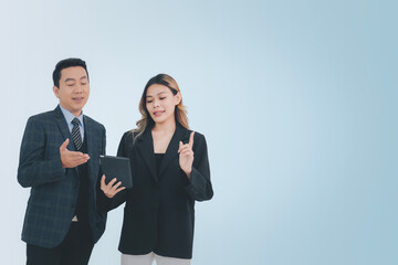 Business people or colleague concept, Businessman and businesswoman using computer laptop or digital tablet working together isolate from background