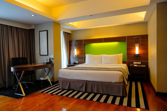 Comfortable bedroom,  modern interior design, luxury bedroom style,  bedding in luxury  modern bedroom.