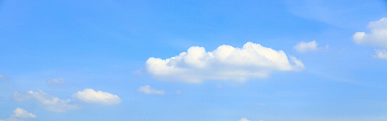 Naklejka na ściany i meble beautiful white clouds in panorama blue sky