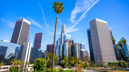 the skyline of los angeles under a blue sky - 602290504
