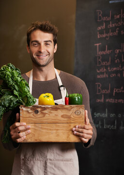 Chef, Vegetable Crate And Portrait Of Man In Restaurant With Vegetables For Vegetarian Or Vegan Ingredients. Smile, Male Cook With Box And Food From Canada For Cooking In Kitchen Or Small Business.