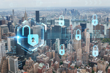 Fototapeta na wymiar Aerial panoramic city view of Upper Manhattan area, the East Side, river and Brooklyn on horizon, New York city, USA The concept of cyber security to protect confidential information, padlock hologram