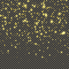 Gold glittering dust on transparent backdrop