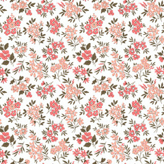 Cute floral pattern in small flowers. Small delicate flowers. White background. Ditsy print. Floral seamless background. The elegant the template for fashion prints. Stock pattern.