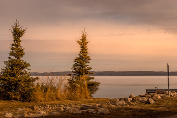 Fototapeta na wymiar Sylvan Lake in the early spring Sylvan Lake Alberta Canada