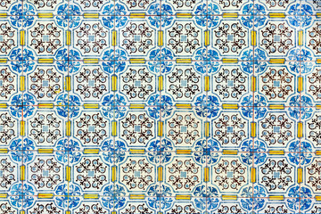 pattern of typical old decorated tiles at a wall in Portugal