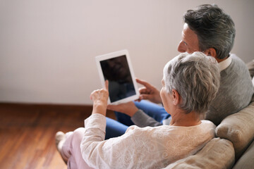 Tablet, mockup or old couple streaming movie or film on online subscription in retirement at home...