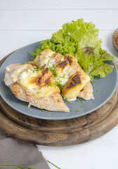 Chicken fillet baked on a plate