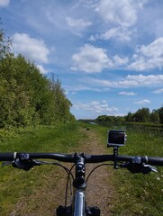 bike on dirt road by the canal