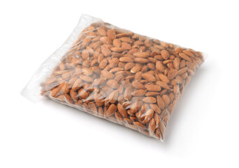 Raw shelled almond nuts in transparent plastic bag