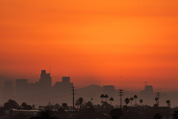 9/7/2022:   A hot summer sun rises over Los Angeles during the end of summer heatwave that caused power disruptions and rolling blackouts