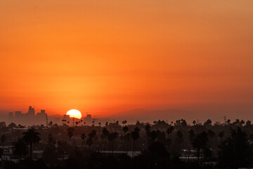 9/7/2022:   A hot summer sun rises over Los Angeles during the end of summer heatwave that caused power disruptions and rolling blackouts