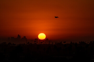 9/7/2022:   A hot summer sun rises over Los Angeles during the end of summer heatwave that caused power disruptions and rolling blackouts