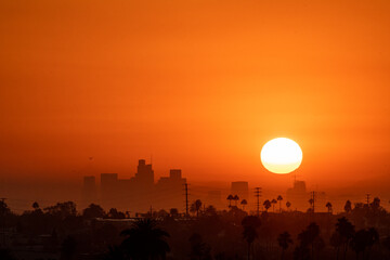 9/7/2022:   A hot summer sun rises over Los Angeles during the end of summer heatwave that caused power disruptions and rolling blackouts