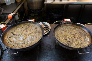 preparation of paella typical spanish dish.