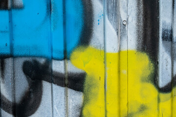 Texture of a yellow and blue painted wall