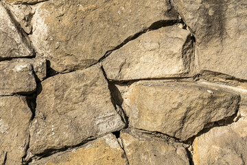 The texture of a stone wall