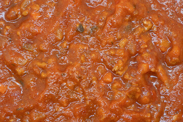 Classic italian bolognese sauce texture background. Preparing lasagna. Making sauce. Italian food. Meat stew.
