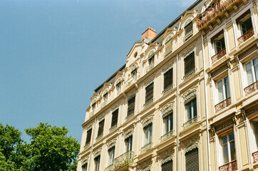 Fototapeta na wymiar Lyon France Old Building with BLue Sky on Kodak Gold FIlm