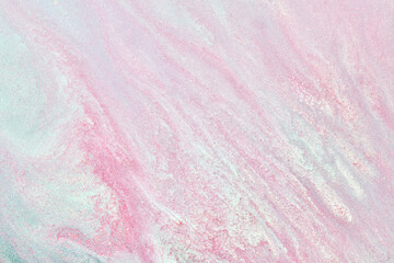 Multicolored creative abstract background. Texture of acrylic paint. Stains and blots of alcohol ink pink blue colors, fluid art.