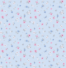 Delicate floral pattern in small abstract flowers. Small white, blue and pink flowers. Light blue background. Ditsy print. Floral seamless background. Cute template for fashion prints. Stock pattern.