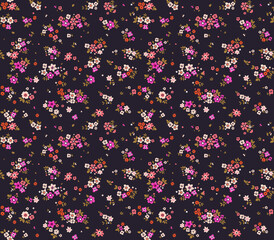 Beautiful floral pattern in small abstract flowers. Small colorful flowers. Dark violet background. Ditsy print. Floral seamless background. Elegant template for fashion prints. Stock pattern.