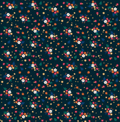 Vector seamless pattern. Pretty pattern in small flowers. Small colorful flowers. Dark blue background. Ditsy floral background. Delicate template for fashion prints. Stock vector.