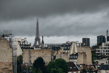 Fototapeta na wymiar View of the Parisian rooftops and the Eiffel Tower from the 16th arrondissement of Paris