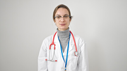 Fototapeta premium Young caucasian woman doctor standing with serious expression over isolated white background