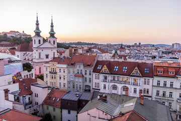 Obraz premium Evening skyline of Brno with the Church of Saint Michael the Archangel and Spilberk castle, Czech Republic