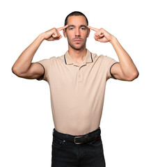 Fototapeta premium Serious young man doing a gesture of concentration