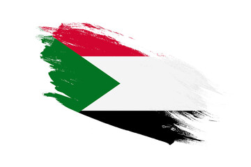 Sudan flag with stroke brush painted effects on isolated white background