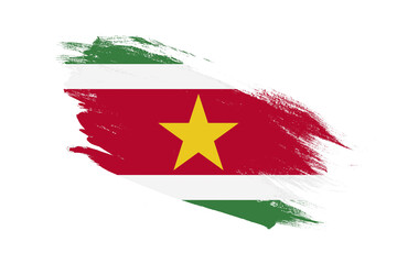 Suriname flag with stroke brush painted effects on isolated white background