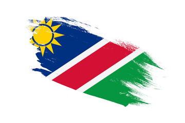 Namibia flag with stroke brush painted effects on isolated white background