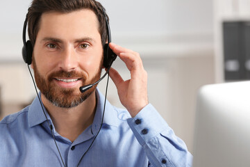 Hotline operator with headset working in office, space for text
